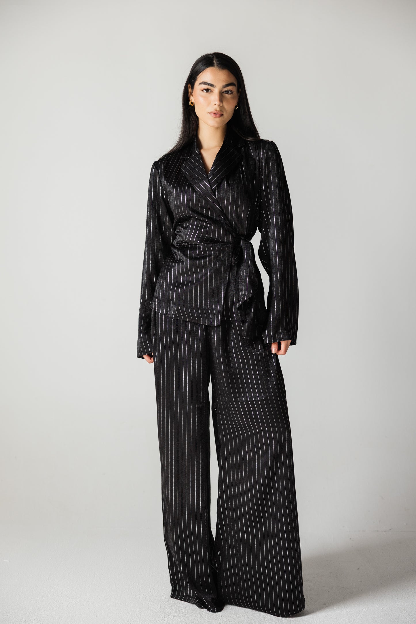 Glowing black striped blazer