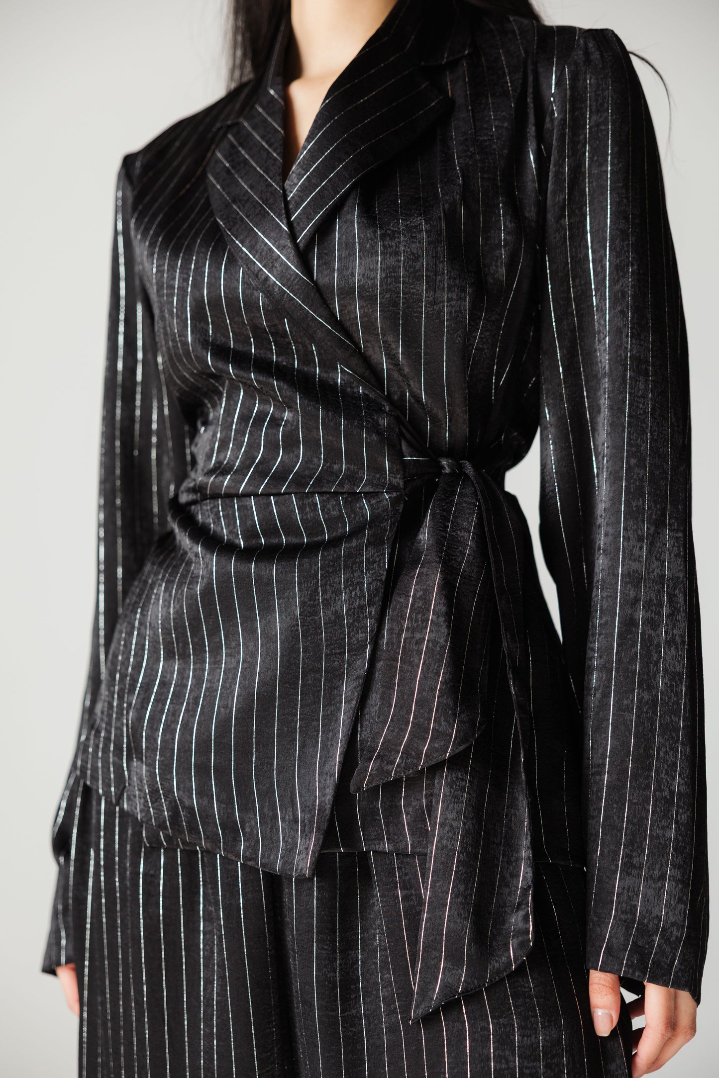 Glowing black striped blazer