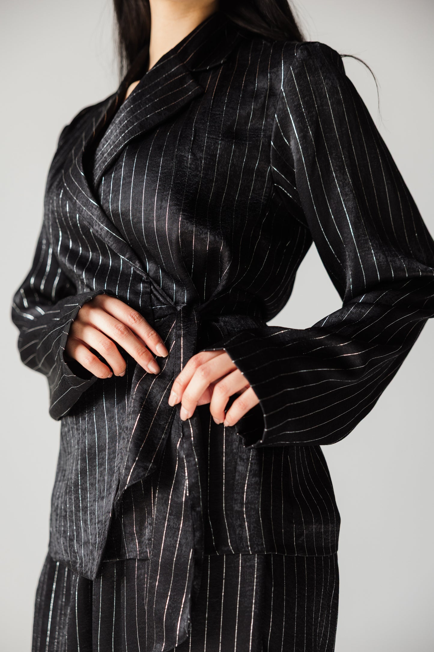 Glowing black striped blazer