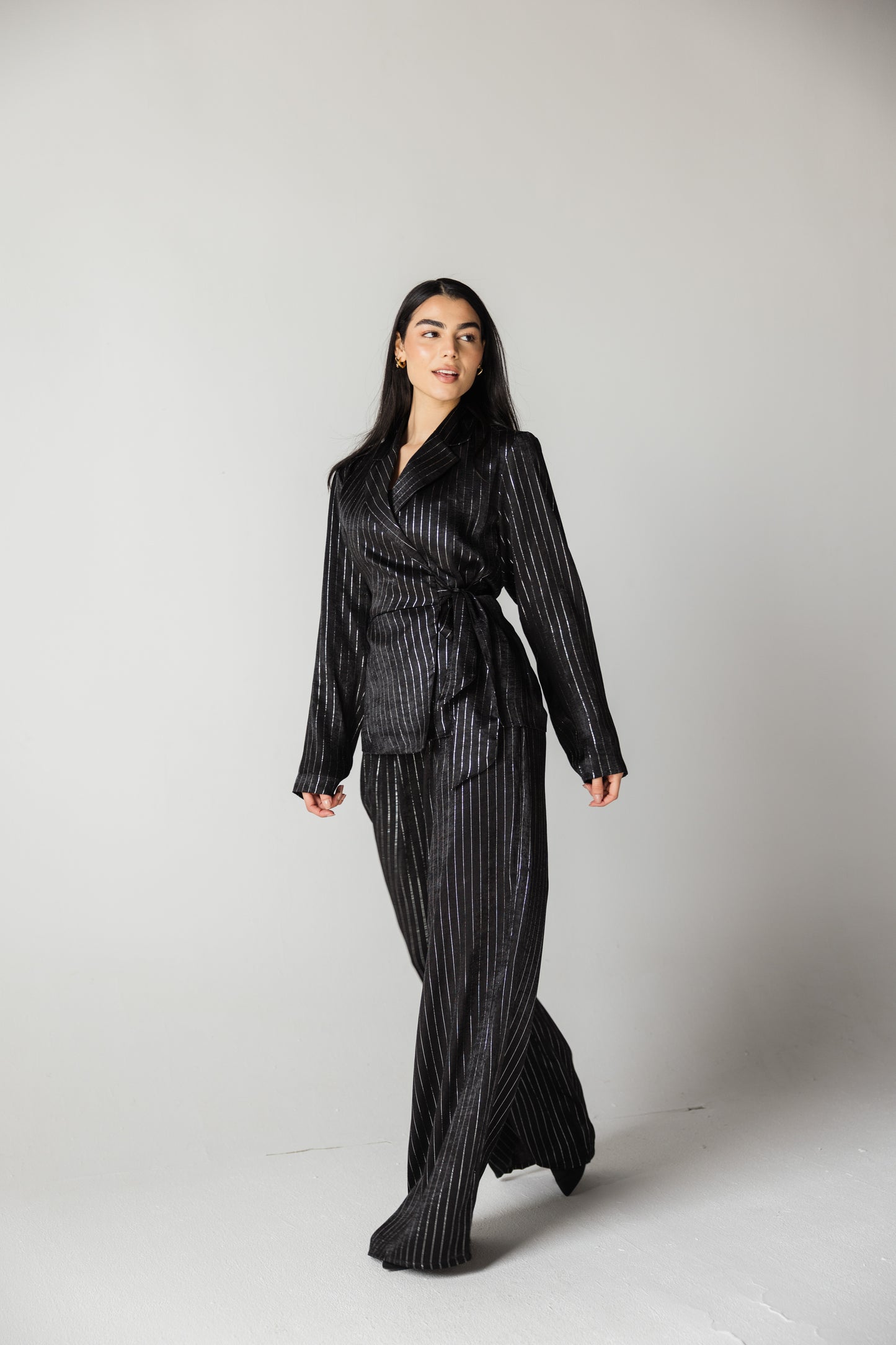 Glowing black striped blazer