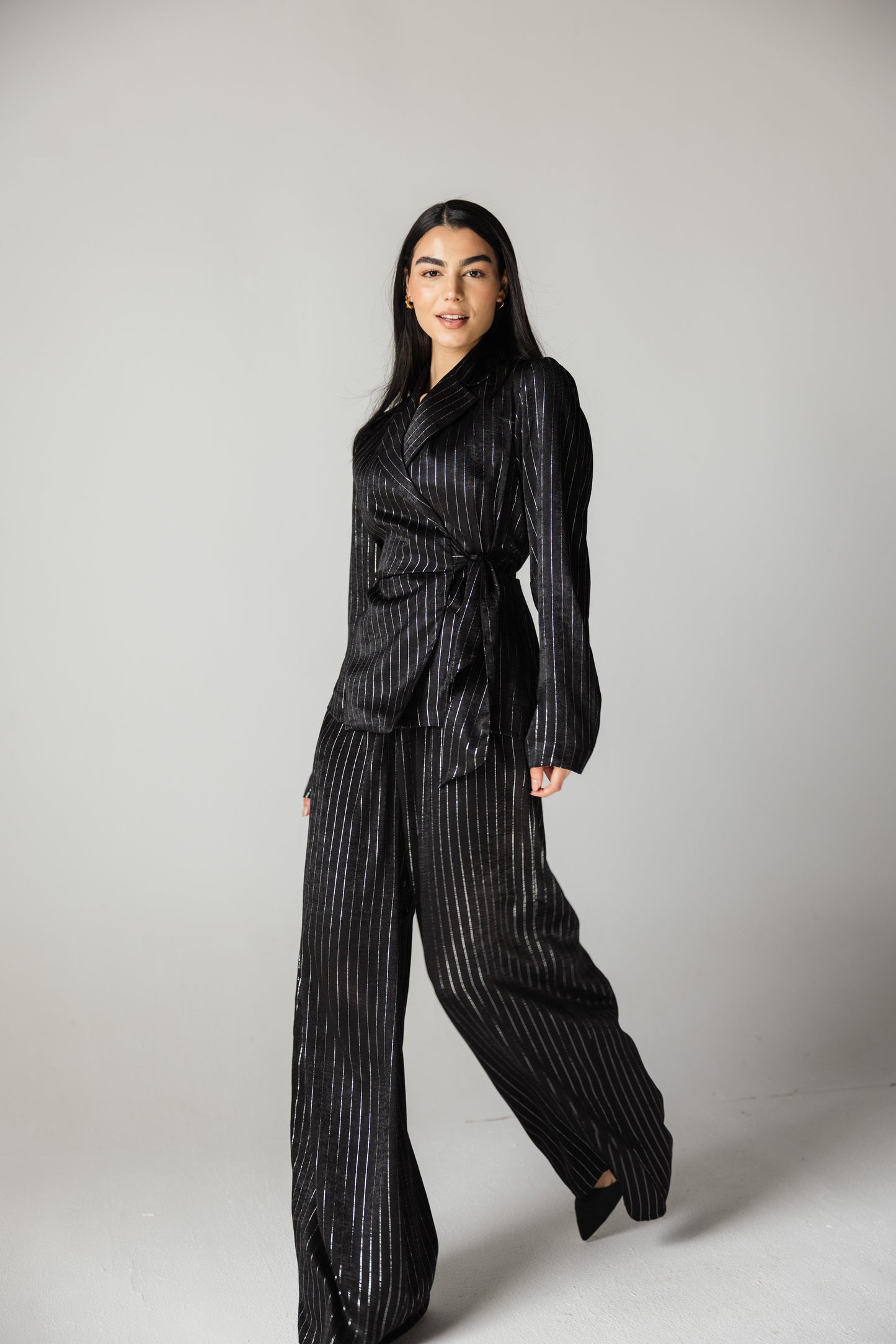 Glowing black striped blazer